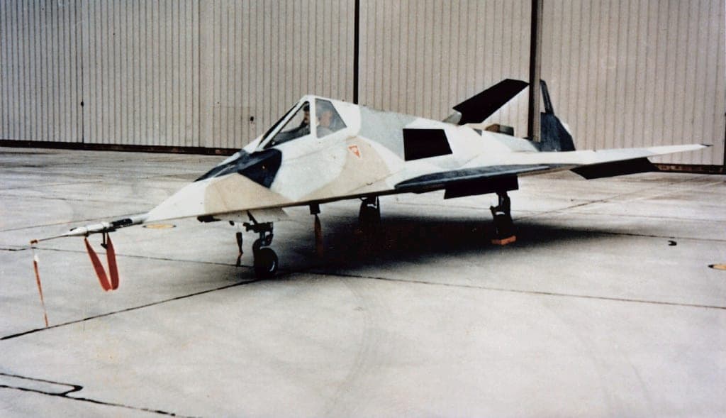 Lockheed Have Blue stealth technology demonstrator parked outside a hangar, in disruptive camouflage
